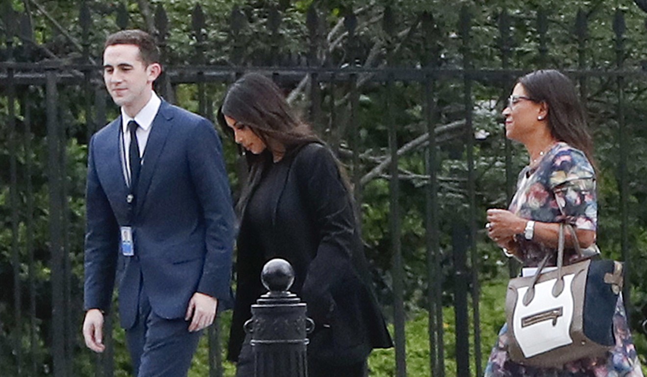 Kim Kardashian arrives with her lawyer Shawn Chapman Holley (right) at a White House gate on May 30. Photo: AP