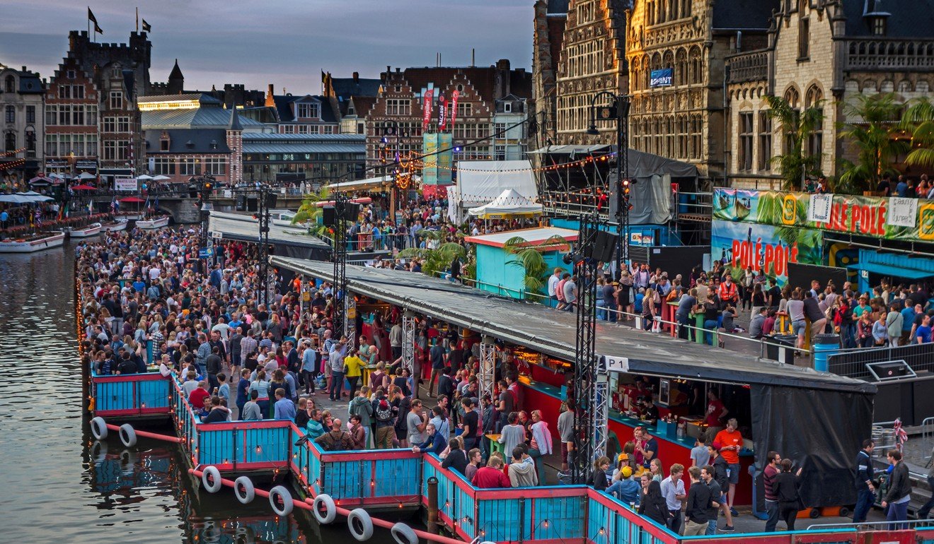 Visitors watching festivities during the Gentse Feesten. Picture: Alamy