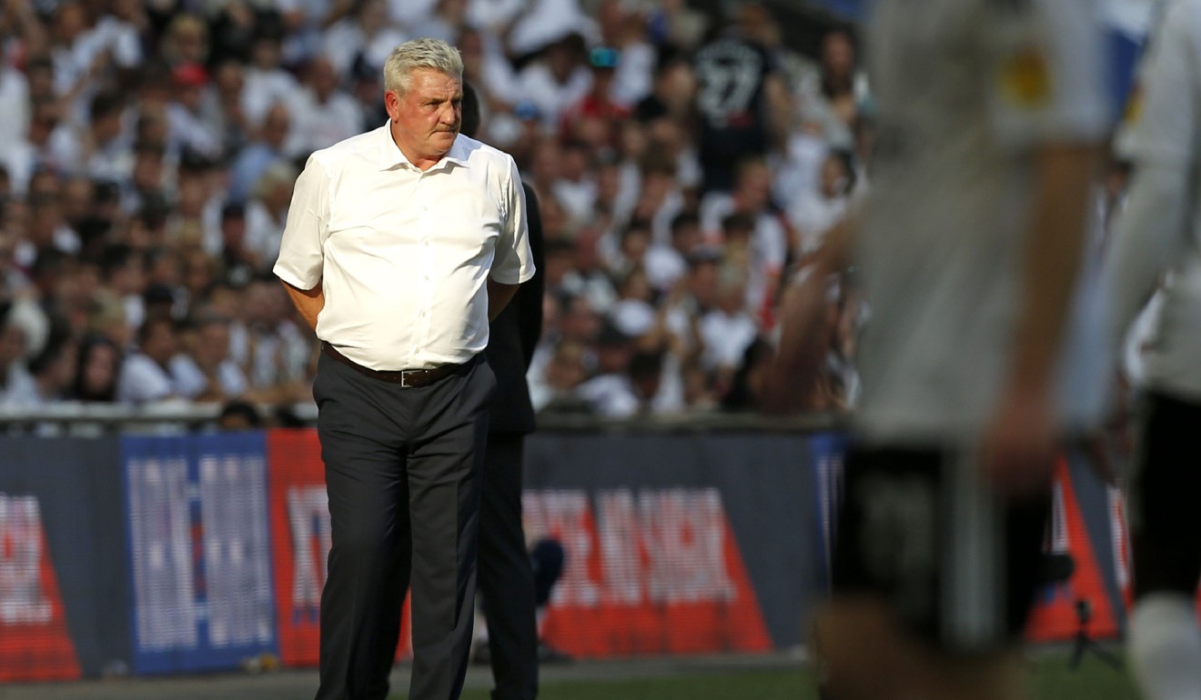 Aston Villa manager Steve Bruce watches from the touchline during the play-off match. Photo: AFP