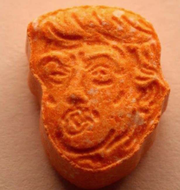 The ‘presidential pills’ show the US president’s face and distinctive hairstyle on one side. Photo: YouTube