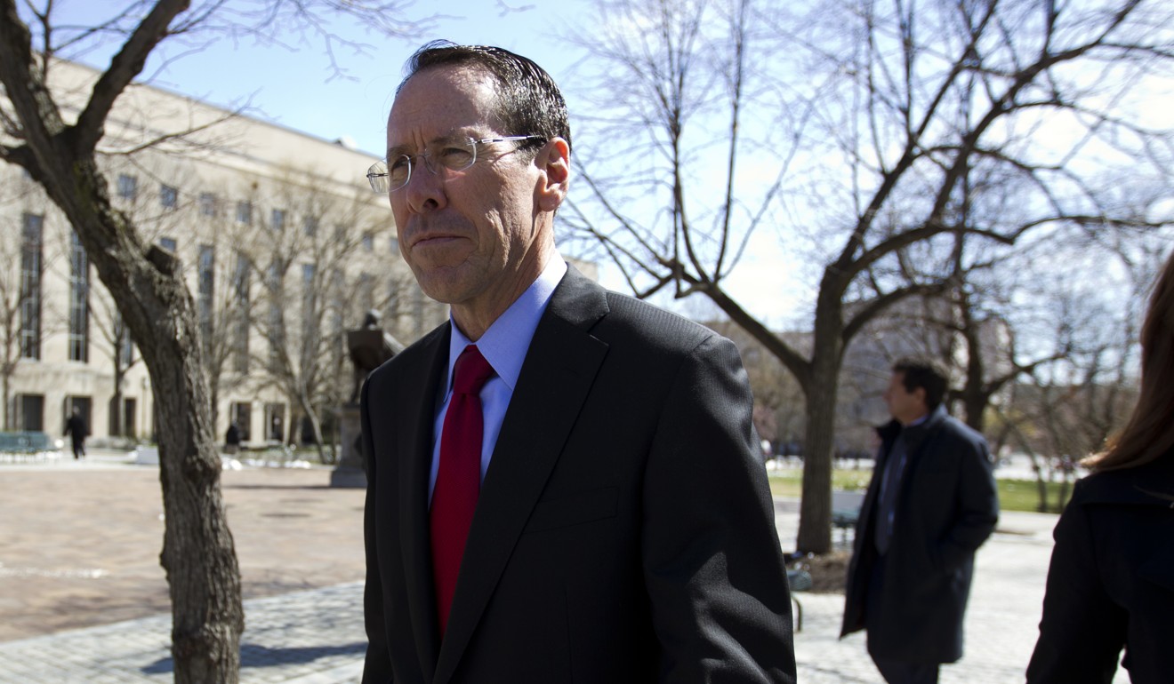 AT&T CEO Randall Stephenson leaves the federal courthouse in Washington in March. Photo: AP
