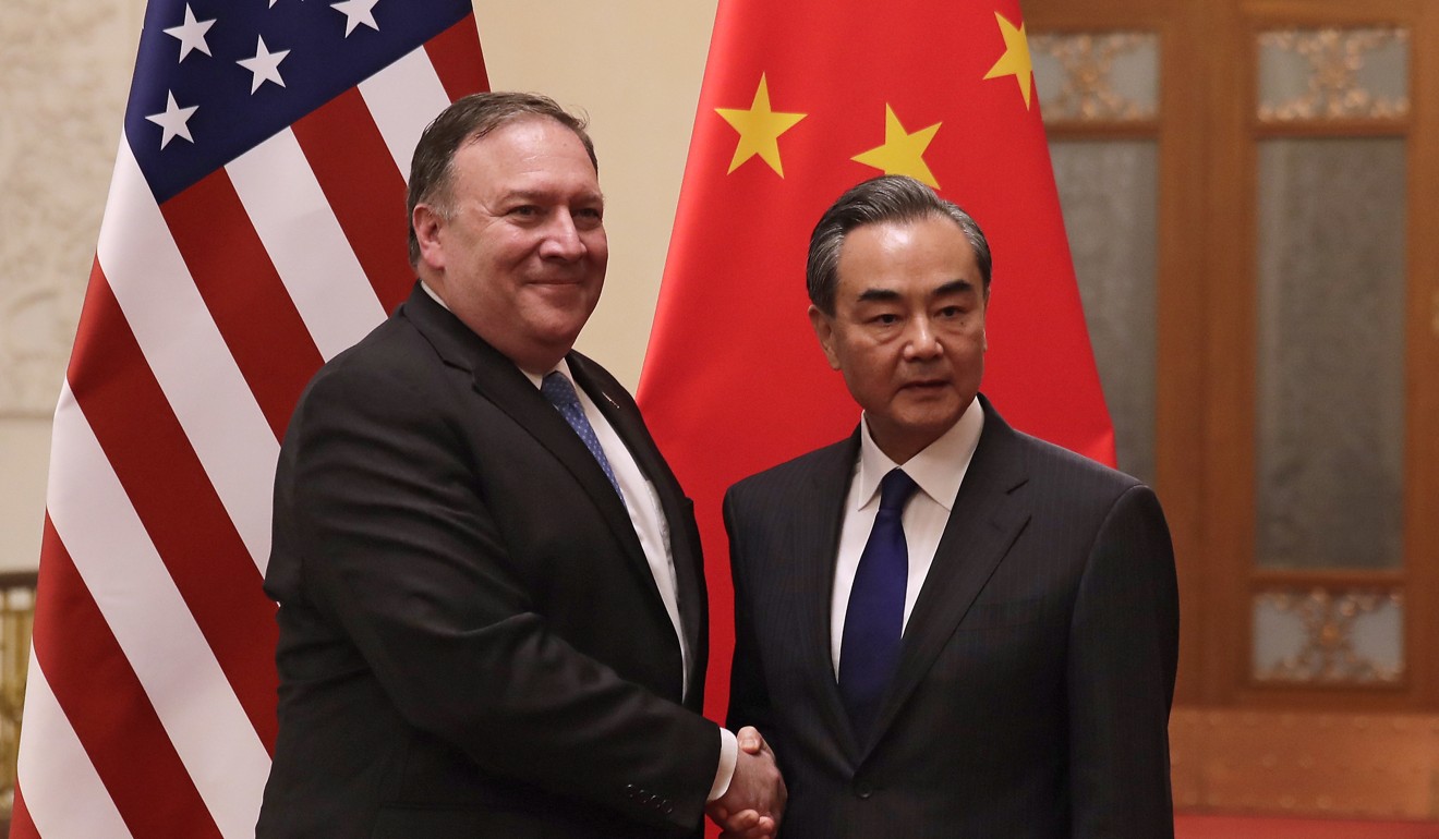 US Secretary of State Mike Pompeo shakes hands with Chinese Foreign Minister Wang Yi on Thursday in the Great Hall of the People in Beijing. Photo: AP