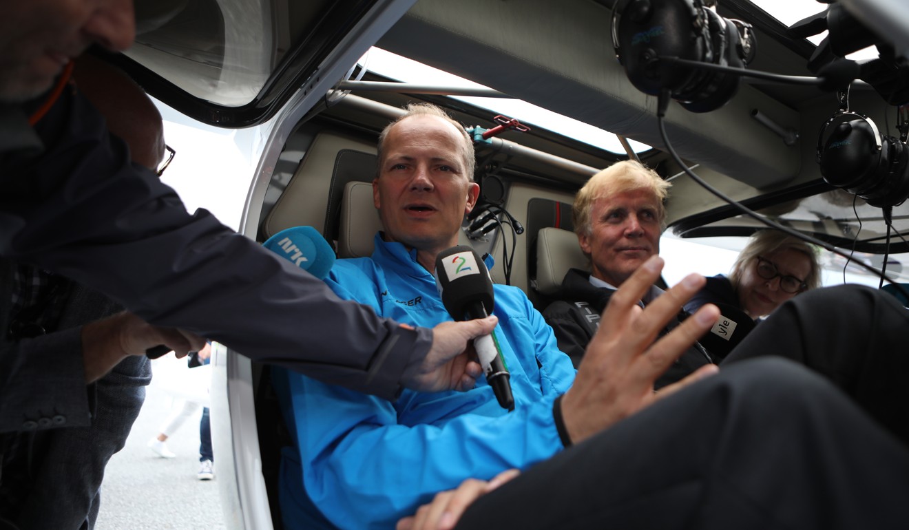 Ketil Solvik-Olsen, Norway's transport minister, left, in the cockpit of an Avinor AS Alpha Electro G2 electric two-seater plane with Dag Falk-Petersen, chief executive officer of Avinor AS. Photo: Bloomberg