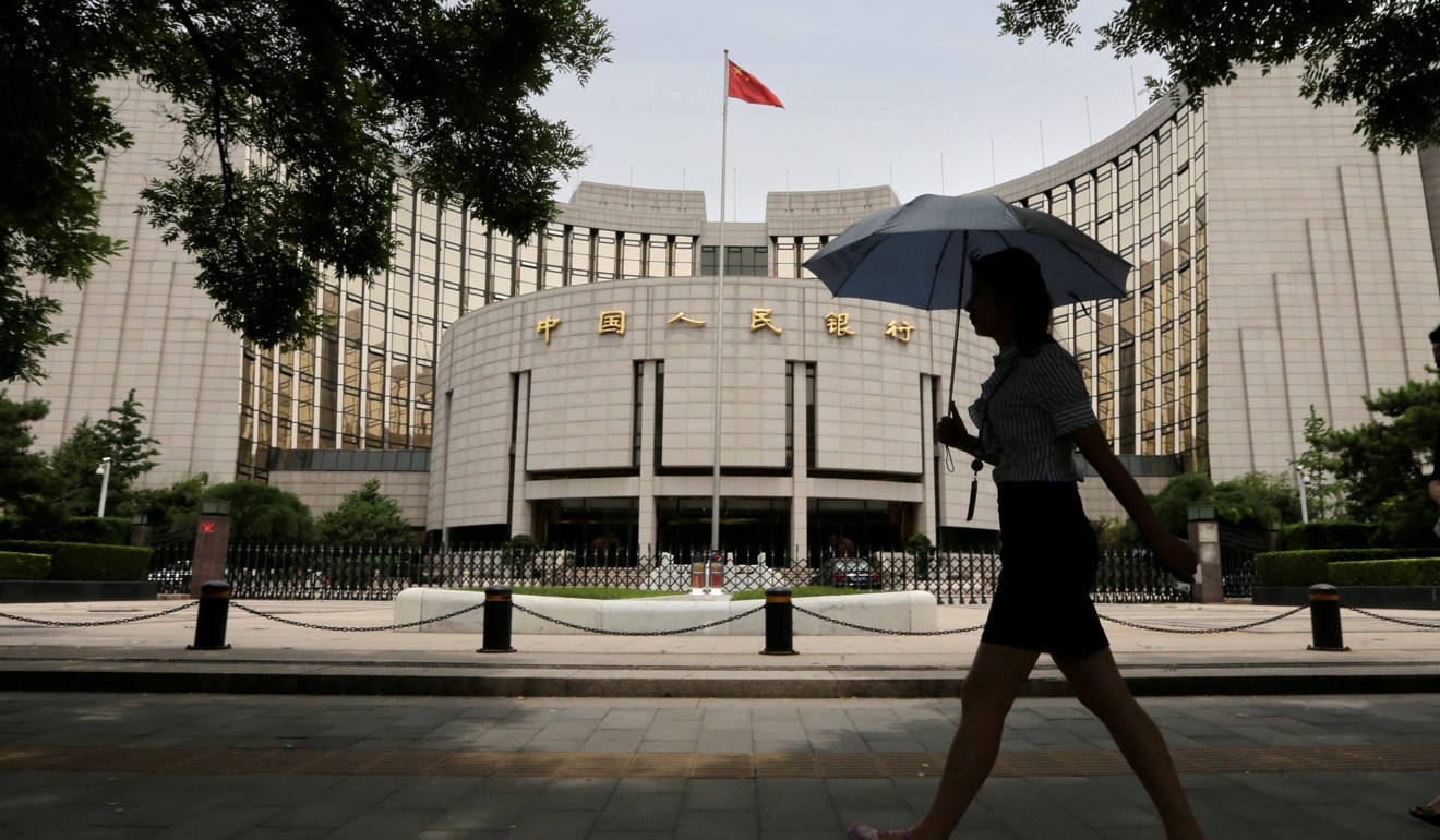 The People’s Bank of China set the yuan midpoint lower by 120 basis points at 6.4706 yuan per US dollar on Thursday, reflecting a five-month low. Photo: Reuters