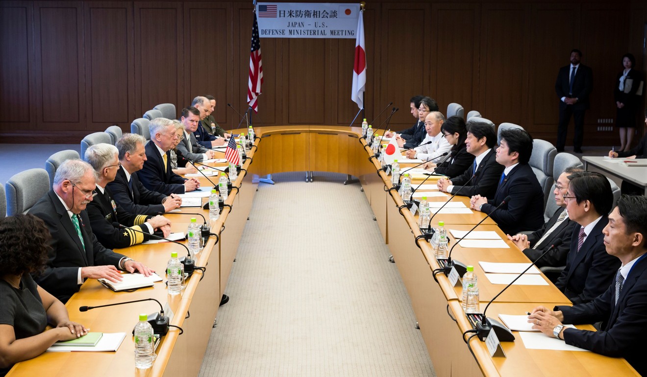 Itsunori Onodera and James Mattis at their meeting in Tokyo. Photo: AFP