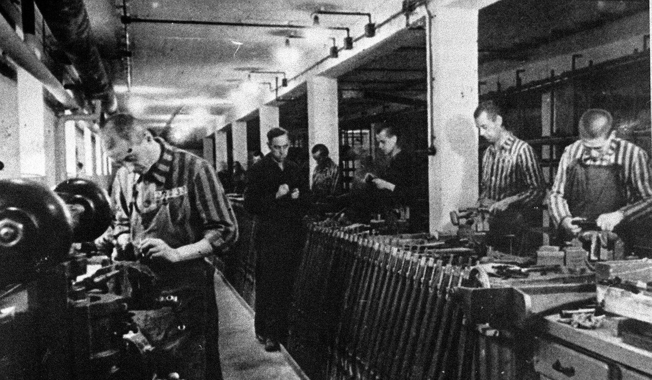 Jewish ‘slave workers’ in striped uniforms in a Nazi ammunition factory near the Dachau concentration camp. File photo: AP