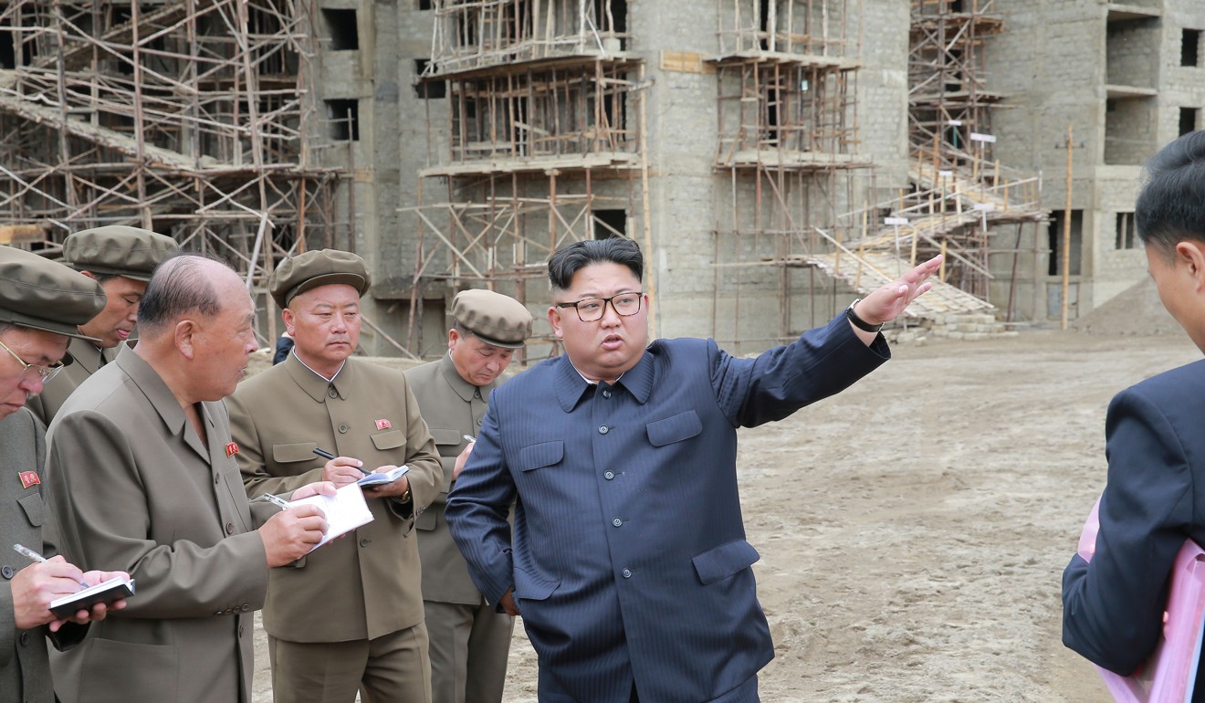 North Korean leader Kim Jong-un (centre) visits a construction site in Samjiyon county. Photo: KCNA