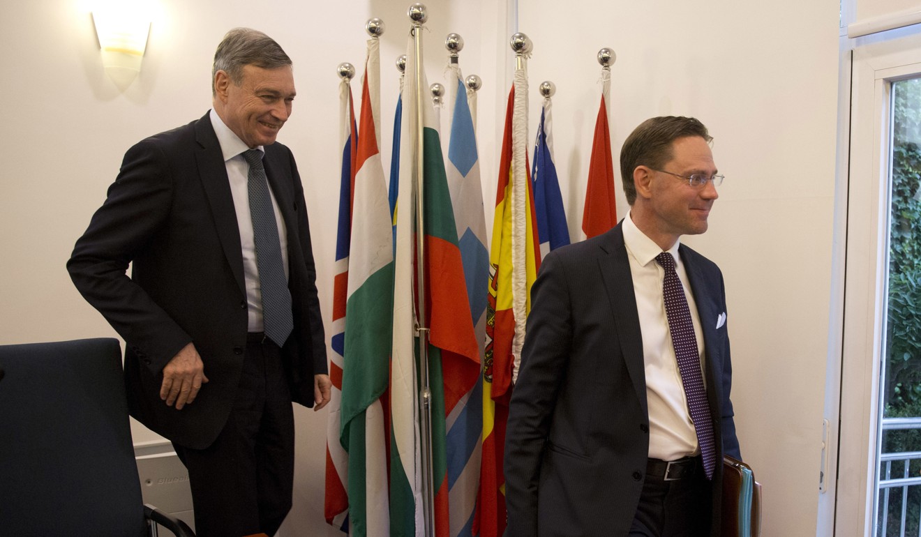 Hans Dietmar Schweisgut, left, the EU ambassador to China, and EU Vice-President Jyrki Katainen in Beijing on June 25. Photo: AP