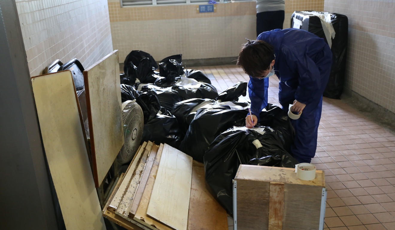 Old and discarded materials are sealed in rubbish bags and labelled as infested with bedbugs. Photo: Rachel Cheung