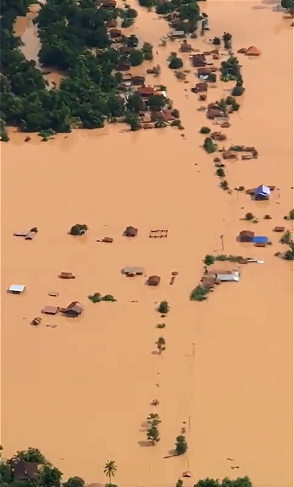 An aerial view of the flooded plains in Attapeu province after a dam collapsed the day before. Photo: AFP