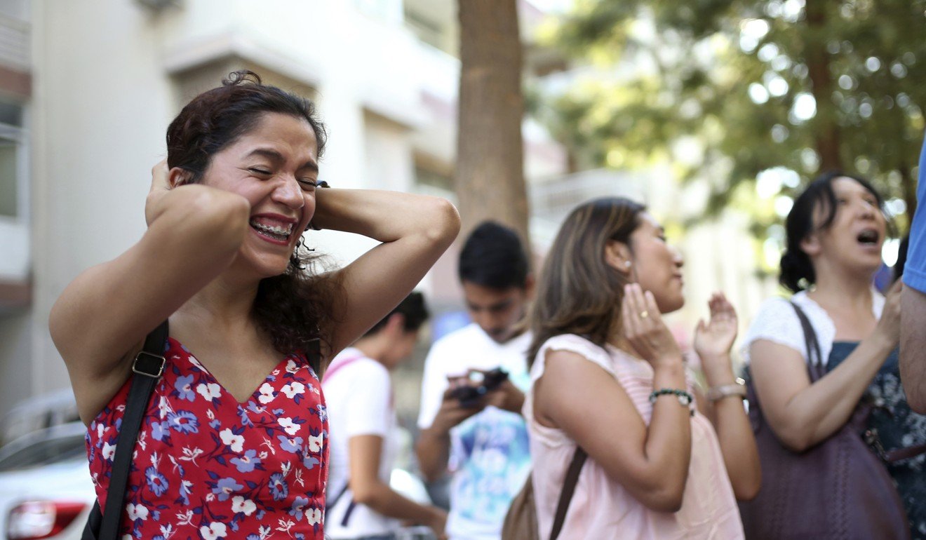 Relatives and friends of Andrew Craig Brunson react as he arrives at his house in Izmir, Turkey, on July 25. Photo: AP