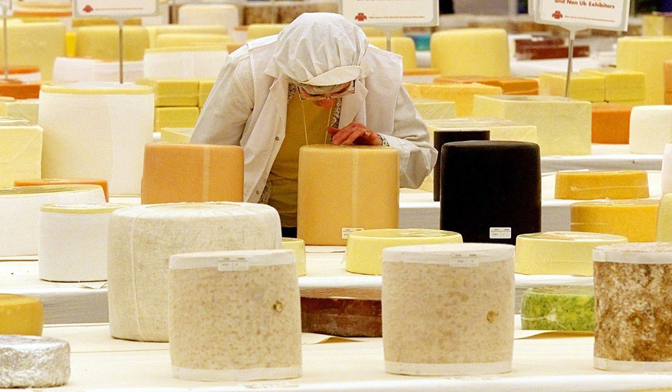 File photo of cheese being judged at a festival in Nantwich. Photo: AP