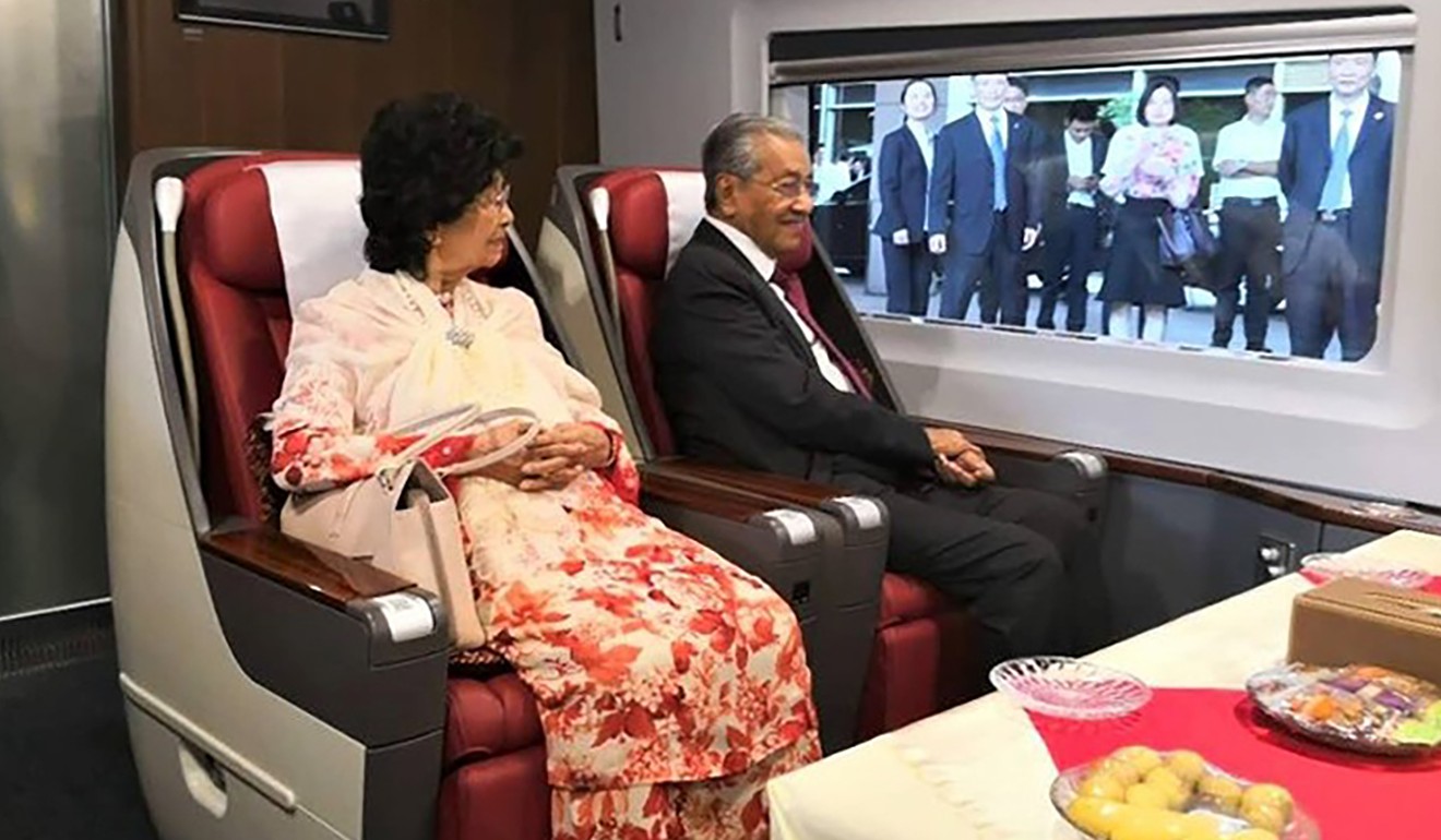 Malaysian Prime Minister Mahathir Mohamad and his wife taking a ride on a high-speed train from Hangzhou to Shanghai. Photo: Handout