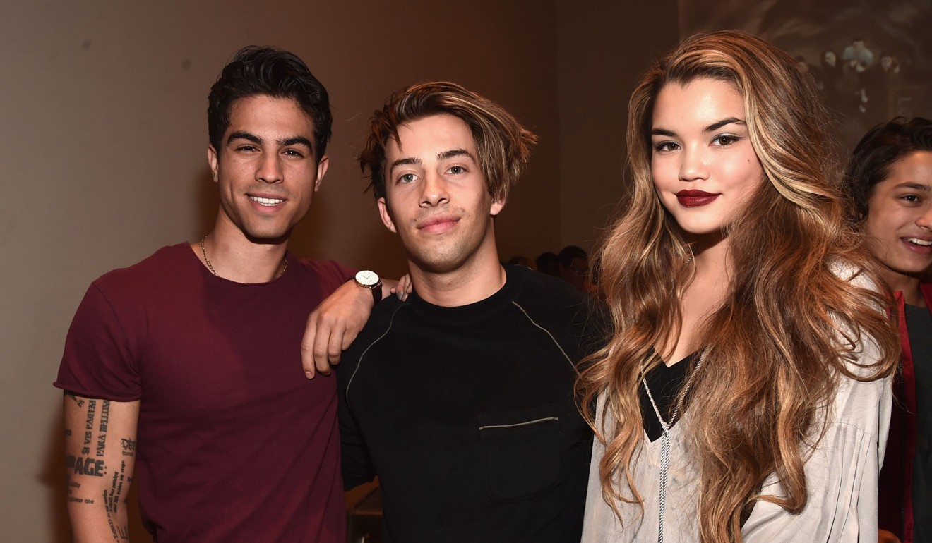 Jimmy Bennett (centre) with fellow actors Luke Ballan and Paris Berelc at the premiere party for Disney XD's “Lab Rats: Elite Force” on March 2, 2016 in Los Angele. Photo: Agence France-Presse
