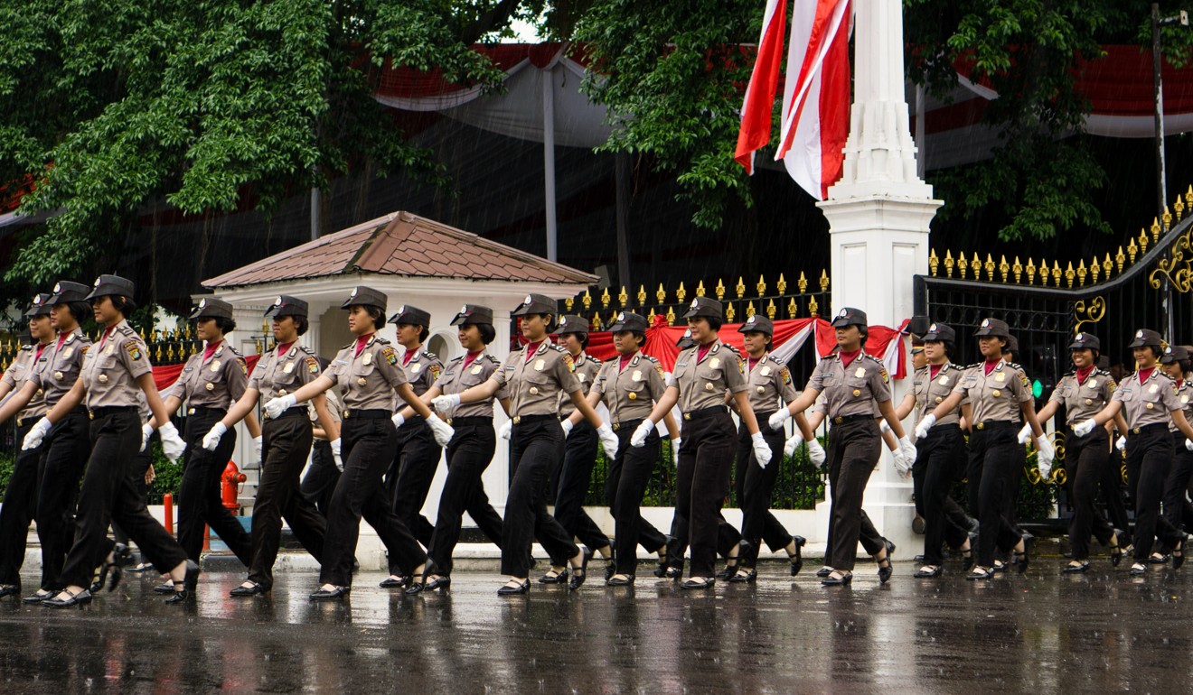 Female police officers in Jakarta. The Indonesian police force announced that it would stop virginity tests on female police applicants in November last year. Photo: Shutterstock