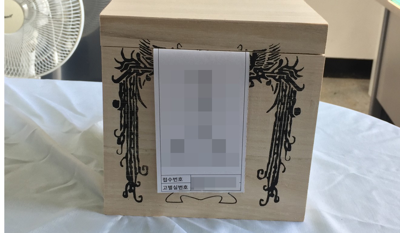 Choi Ran’s ashes rest in a box at the Yongin Crematorium. Photo: Josephine Ma