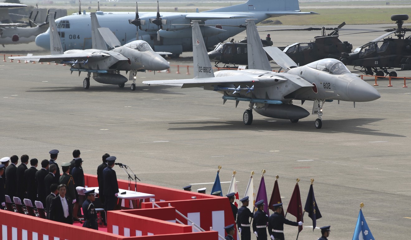 Japan remains wary of North Korean promises to abandon its nuclear weapons and ballistic missile programmes. Photo: AP