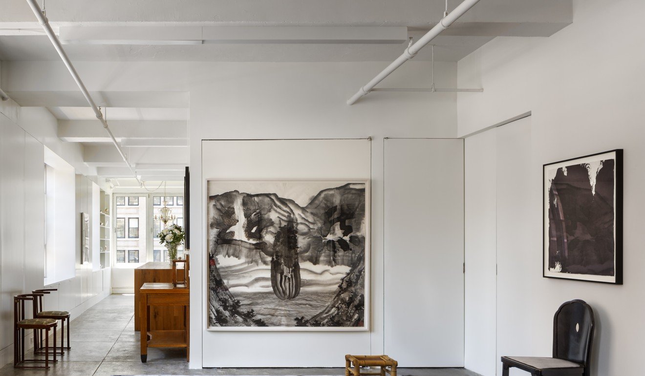 Artwork adorns the walls of Han Feng's Manhattan York apartment, located between Madison Square Garden, the Fashion Institute of Technology and the Empire State Building. Photo: Francis Dzikowsky/OTTO