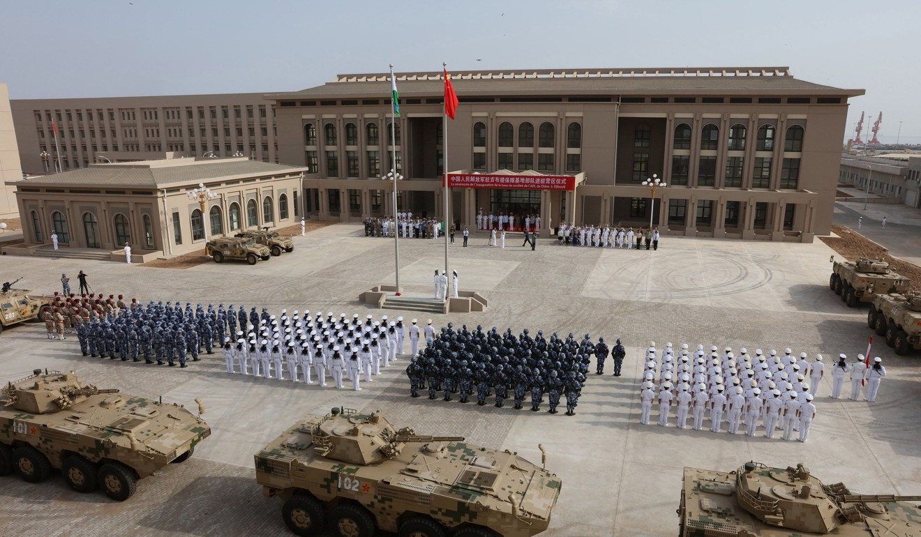 Chinese People’s Liberation Army personnel attend the opening of China’s new military base in Djibouti, where it has established its first overseas naval base. Photo: AFP