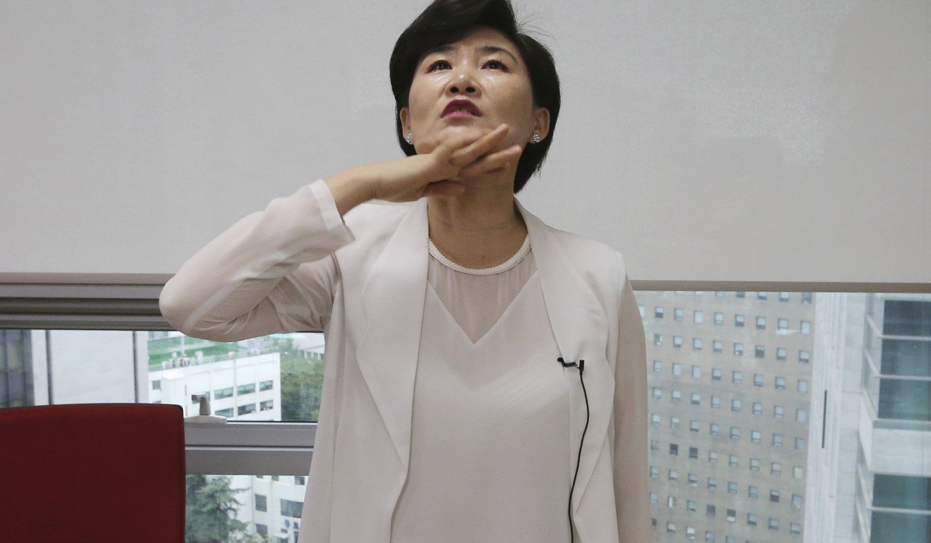 Kim Jungah shows proper posture for goose-stepping. Photo: AP