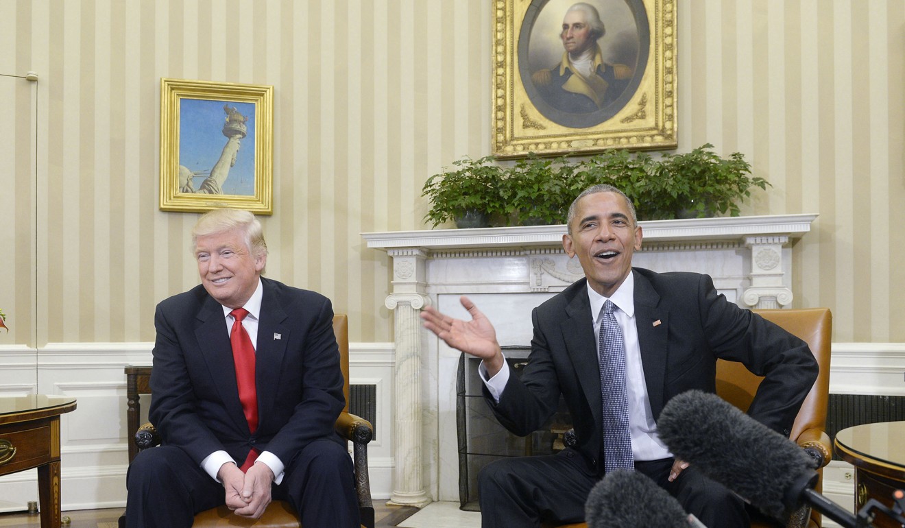 President Barack Obama meets with President-elect Donald Trump in the Oval Office in 2016. File photo: TNS