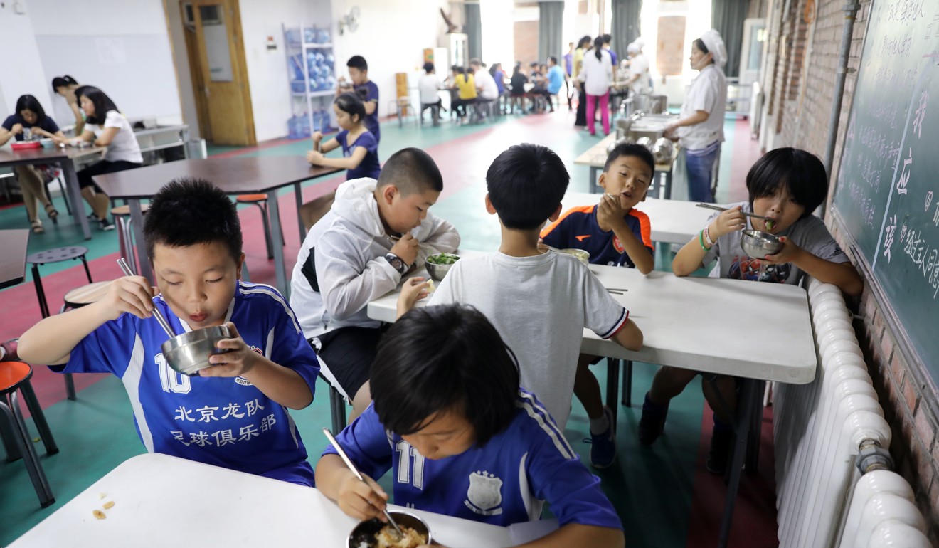 Pupils at Ririxin School in Changing district, Beijing. Only in 2012 did China manage to achieve its goal, set in 1993, of spending more than 4 per cent of its GDP on education. Photo: Simon Song