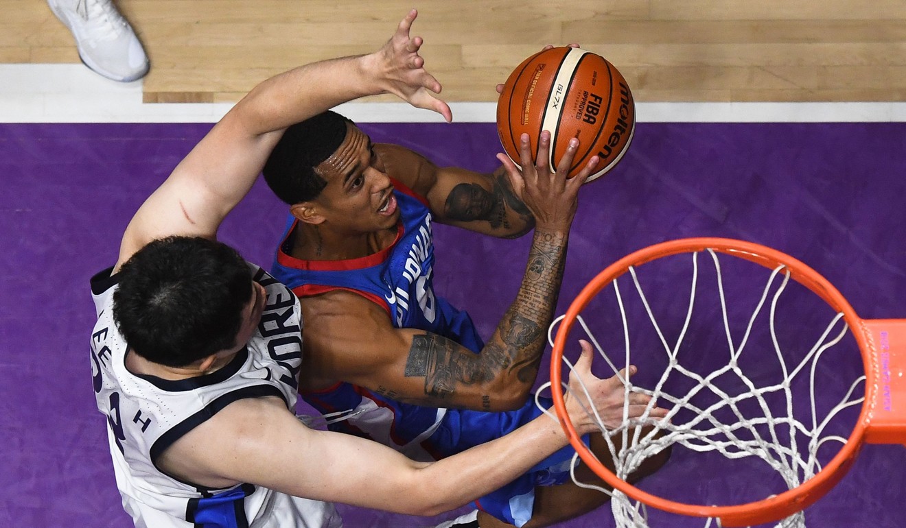 Clarkson goes for the basket against South Korea. Photo: AFP