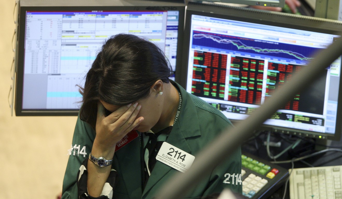 Elizabeth Rose, a specialist with Lehman Brothers MarketMakers, working her post on the trading floor of the New York Stock Exchange on September 15, 2008. Photo: AP
