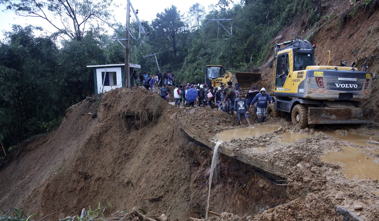 A road damaged by Typhoon Mangkhut in Itogon, Benguet province in the far north of the Philippines on September 16, 2018. Photo: EPA