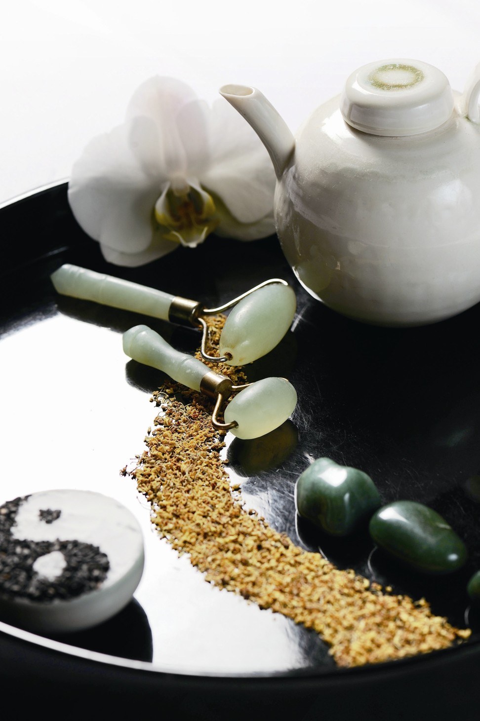 Jade rollers to be used in a facial treatment