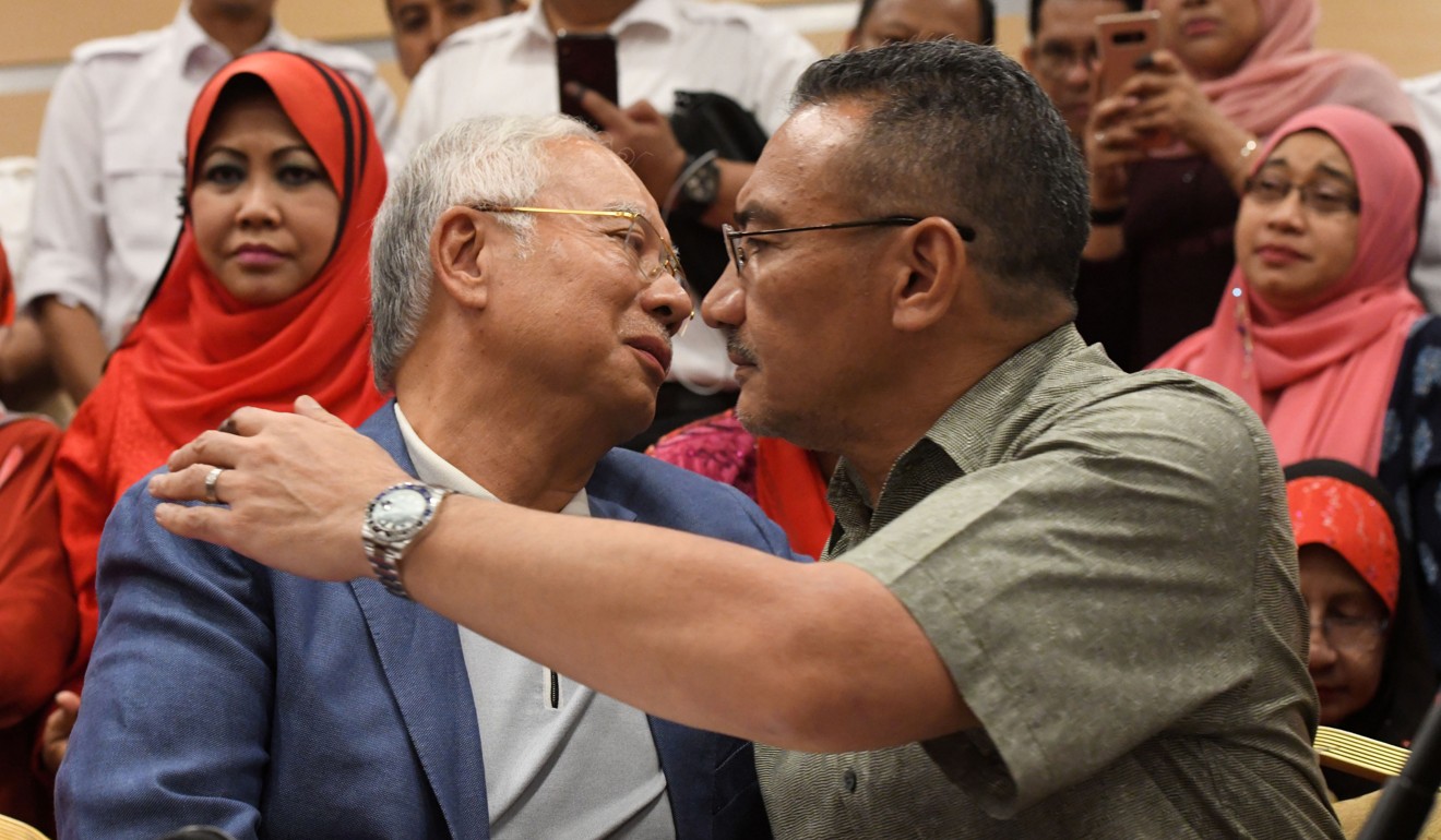 Najib Razak with his cousin, Umno MP Hishammuddin Hussein, who is rumoured to have met Malaysian Prime Minister Mahathir Mohamad. Photo: AFP