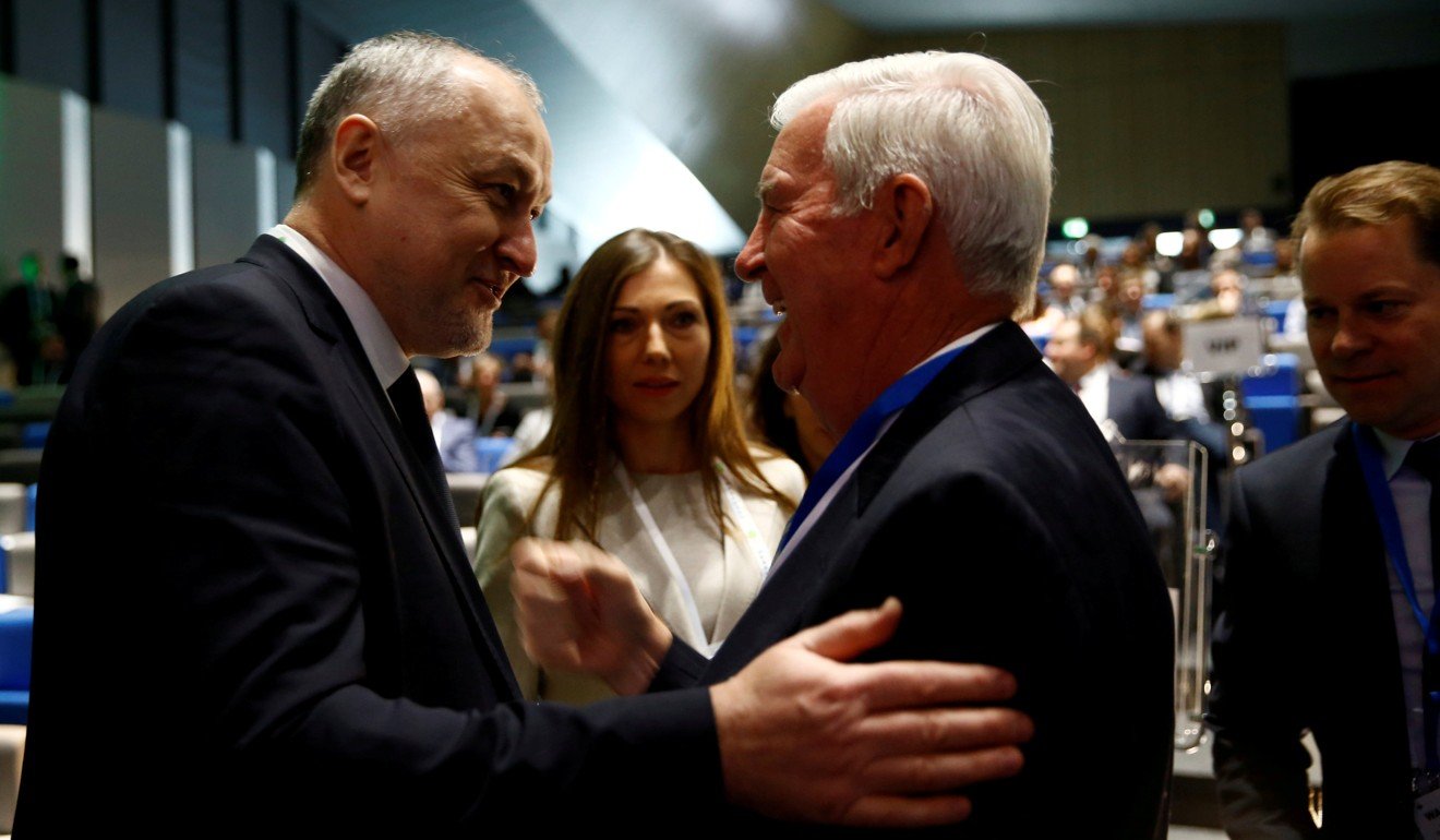 Craig Reedie (second right), president of the World Anti-Doping Agency (Wada), welcomes Yuri Ganus, Russian Anti-Doping Agency director general, at the Wada Symposium in Ecublens, near Lausanne, Switzerland, in March 2018. Photo: Reuters