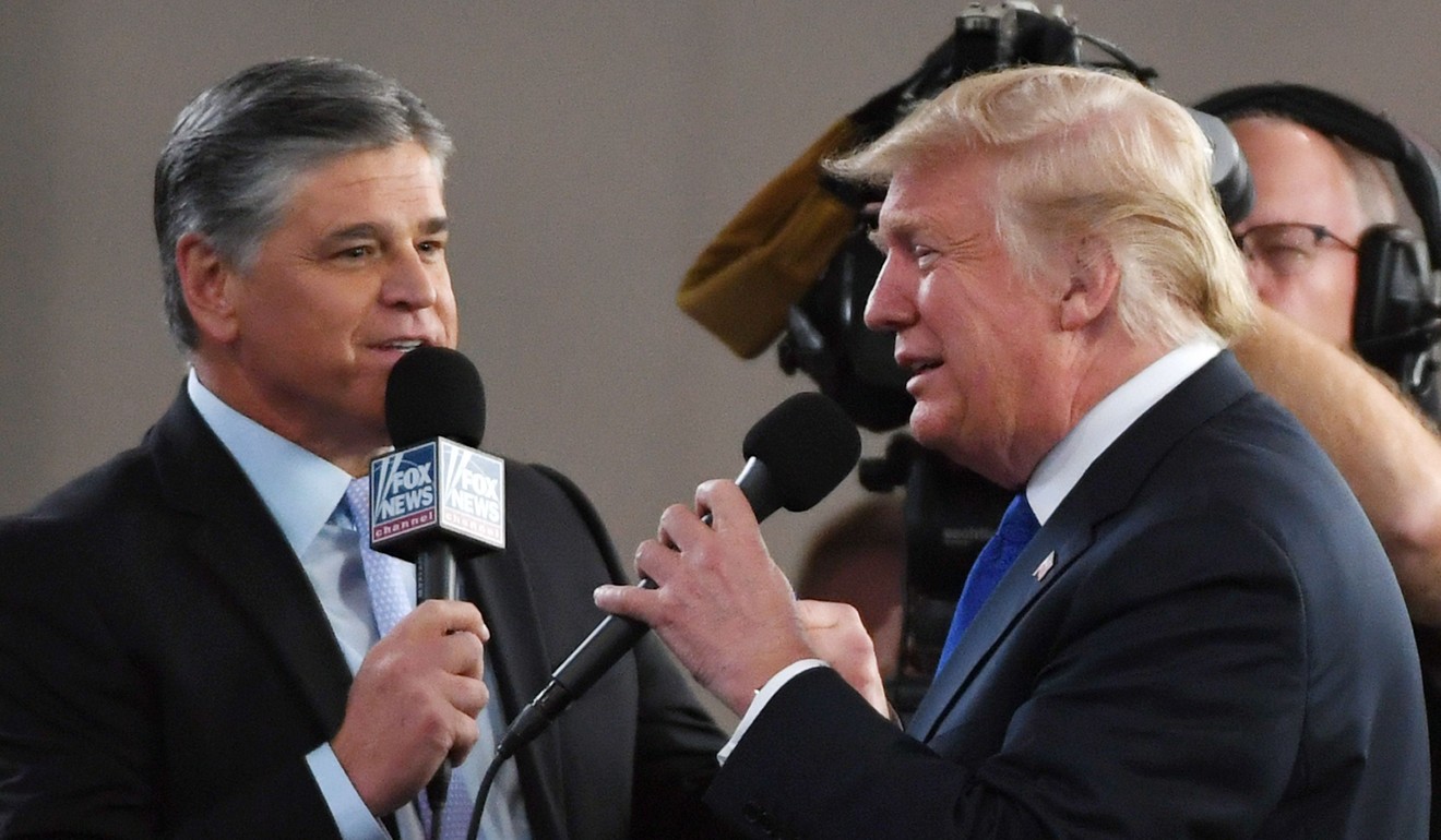 Fox News host Sean Hannity interviews US President Donald Trump. Photo: AFP
