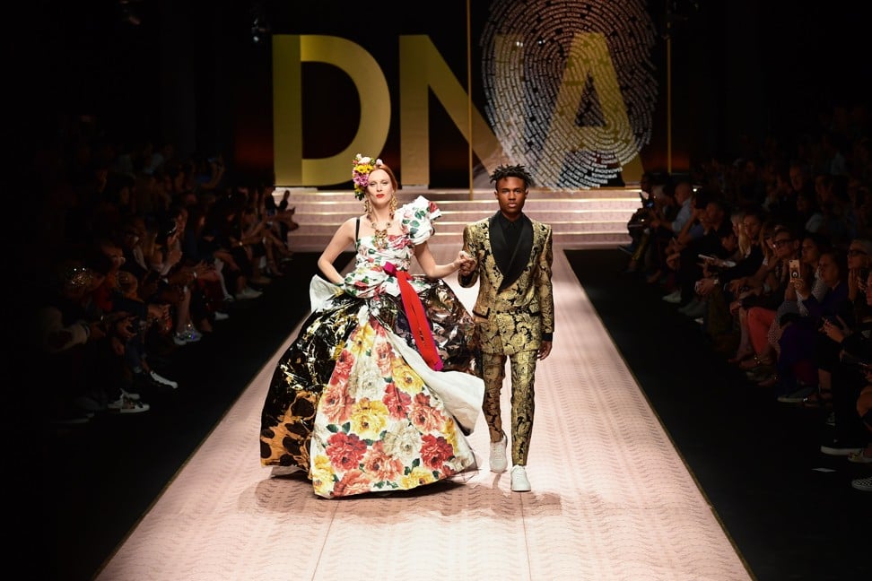 British model Karen Elson closed the show, wearing a wide dress apparently made of flower-patterned and metallic papier-mache as Kailand Morris accompanied her. Photo: AFP