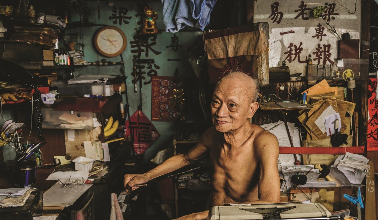 Chen Kau has used the same typewriter for 46 years. Photo: Gary Jones