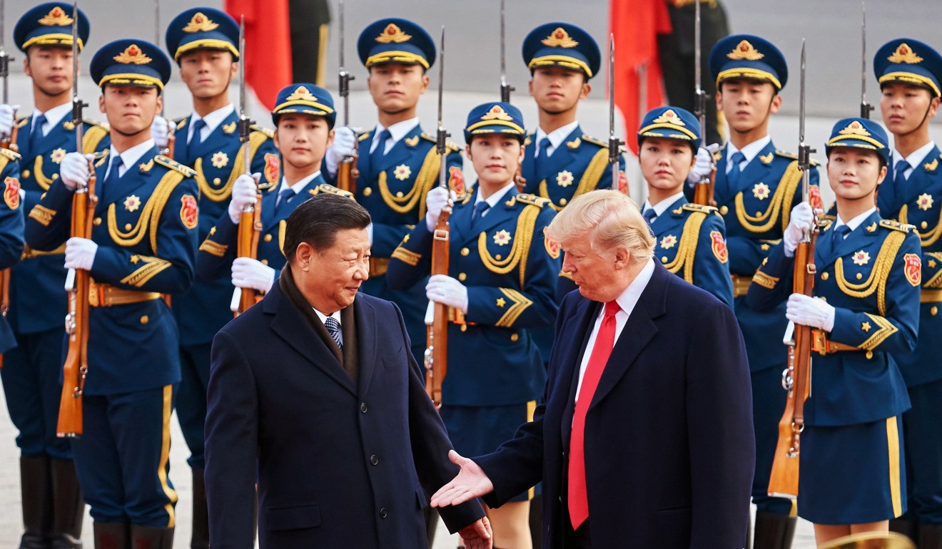 Chinese President Xi Jinping and his US counterpart Donald Trump shake hands outside the Great Hall of the People in Beijing in 2017. China’s history of “national humiliation” should not be allowed to affect its relations with other major powers. Photo: TNS