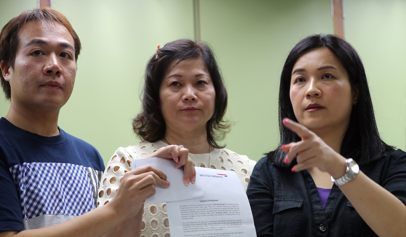 Carol Ng, (right), speaks to the media after British Airways had announced it was sacking 85 flight attendants. Photo: Edward Wong