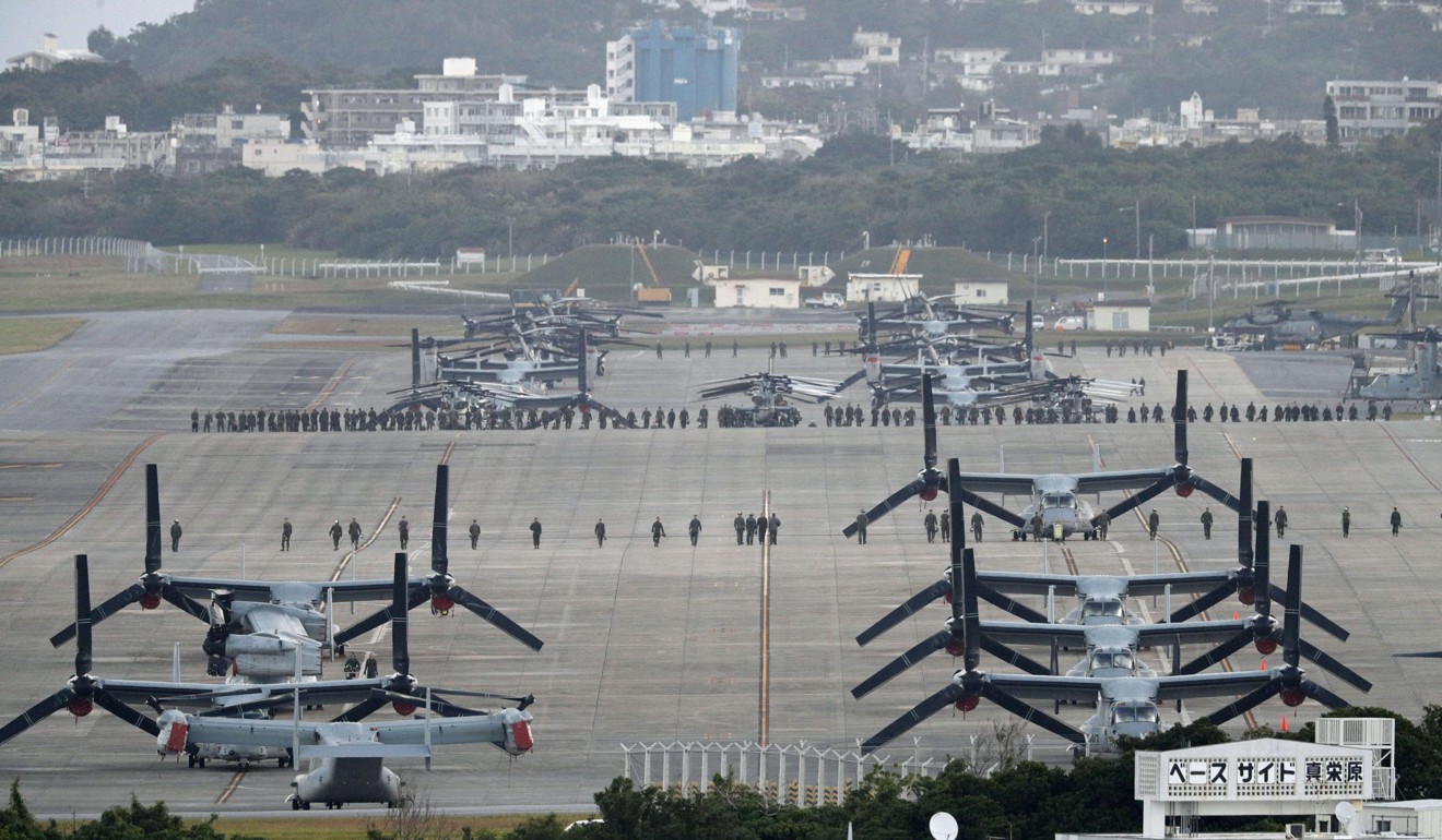 The hot topic of the election is Marine Corps Air Station Futenma, which is surrounded by housing in the ever-expanding city of Ginowan. Photo: Kyodo