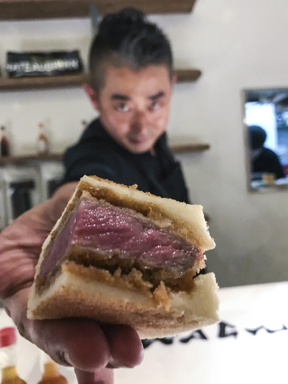 A piece of the HK$800 Ozaki beef sandwich from the Elephant Grounds pop-up in Causeway Bay. Photo: Bernice Chan