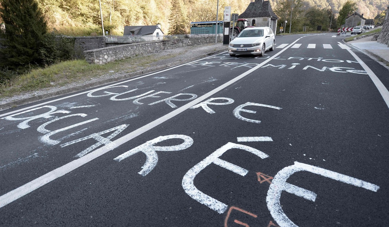 ‘War is declared’ painted on a road in Sarrance, France, by angry farmers protesting against the introduction of two she-bears from Slovenia. Photo: AFP