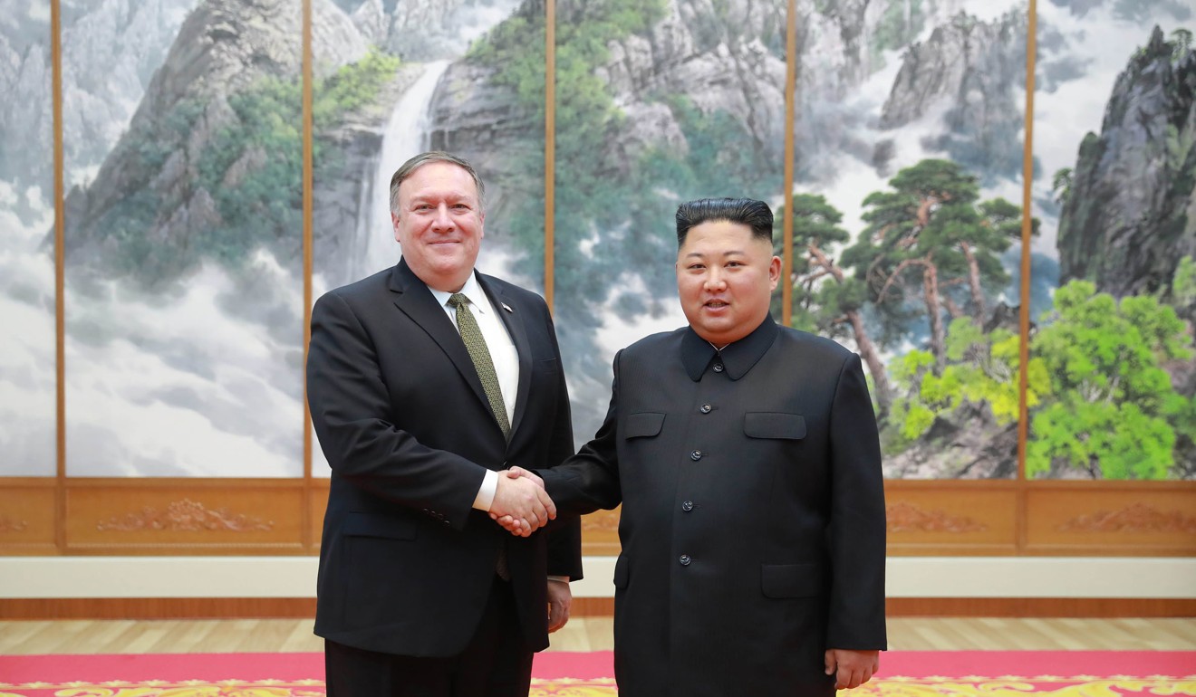 US Secretary of State Mike Pompeo shakes hands with North Korean leader Kim Jong-un as they pose for a photo in Pyongyang, North Korea, on Sunday. International inspectors will be allowed into North Korea’s dismantled nuclear testing site, Pompeo said. Photo: AP