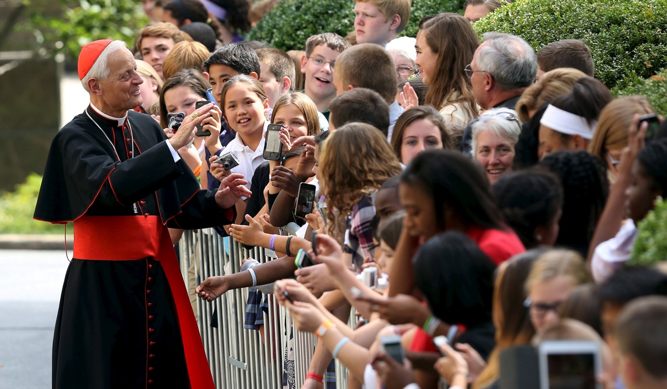 Wuerl greeting schoolchildren at the Vatican embassy in Washington in September, 2015. Photo: Reuters