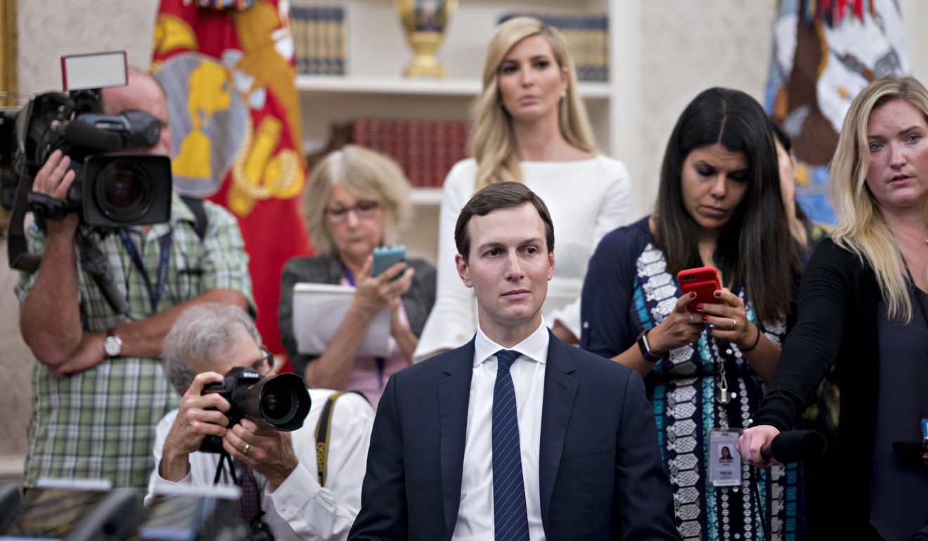 Kushner with his wife, Ivanka, behind him, during a meeting between Donald Trump and the rapper Kanye West this month at the White House. Photo: Bloomberg.