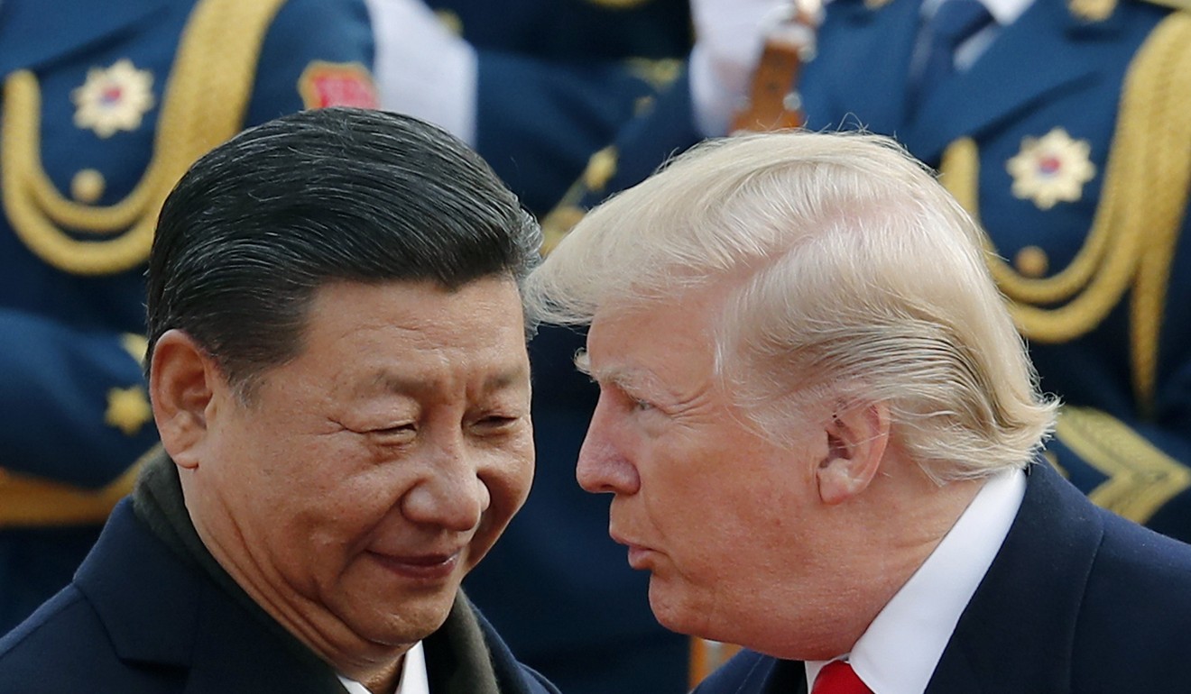 Donald Trump chats with Xi Jinping during the US president’s visit to Beijing in November. Photo: AP