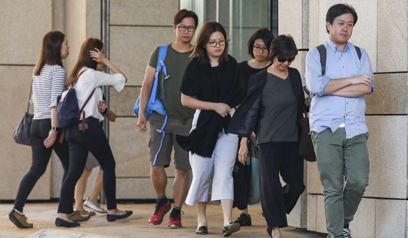 The family of the deceased taxi driver Chan Fai-wong leaving West Kowloon Court in Cheung Sha Wan after attending the inquest on October 5. Photo: Nora Tam