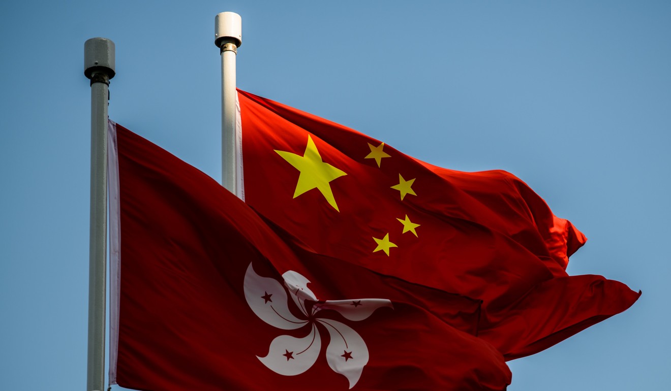 The flags of China and Hong Kong. Photo: AFP