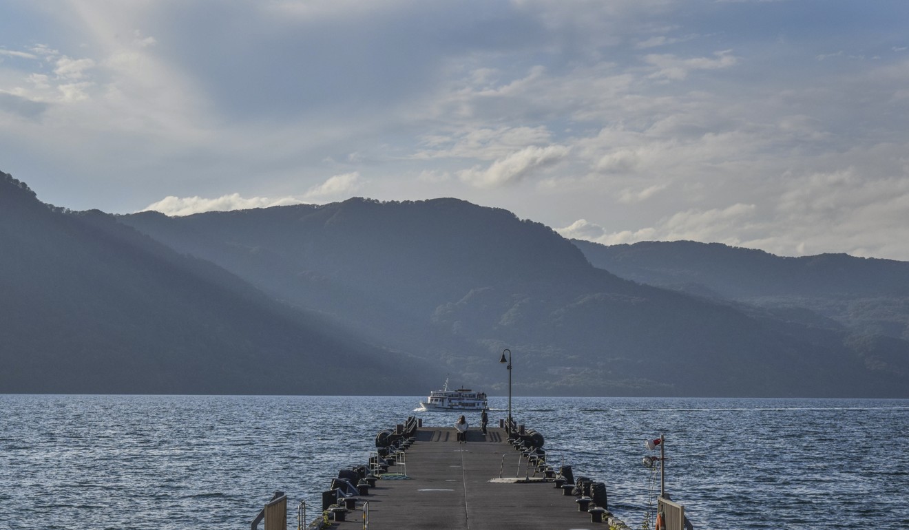 A view of the mountains surrounding Lake Towada from the Towadako pier. Photo: Pete Ford