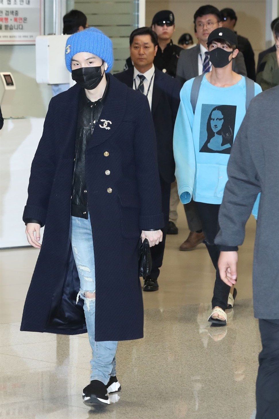 V, Suga of BTS are seen leaving Incheon International Airport on