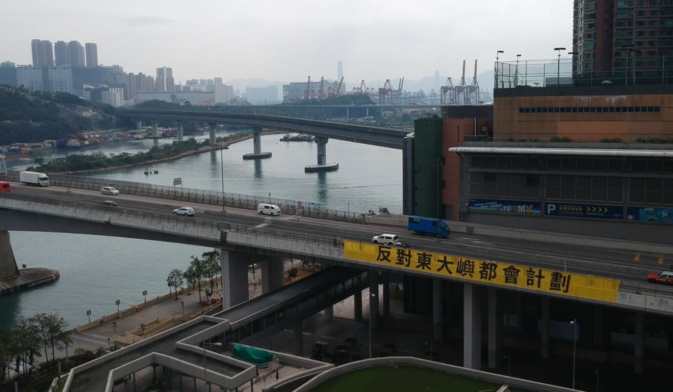 A huge banner against the reclamation plan is displayed on a bridge in Tsing Yi. Photo: Handout