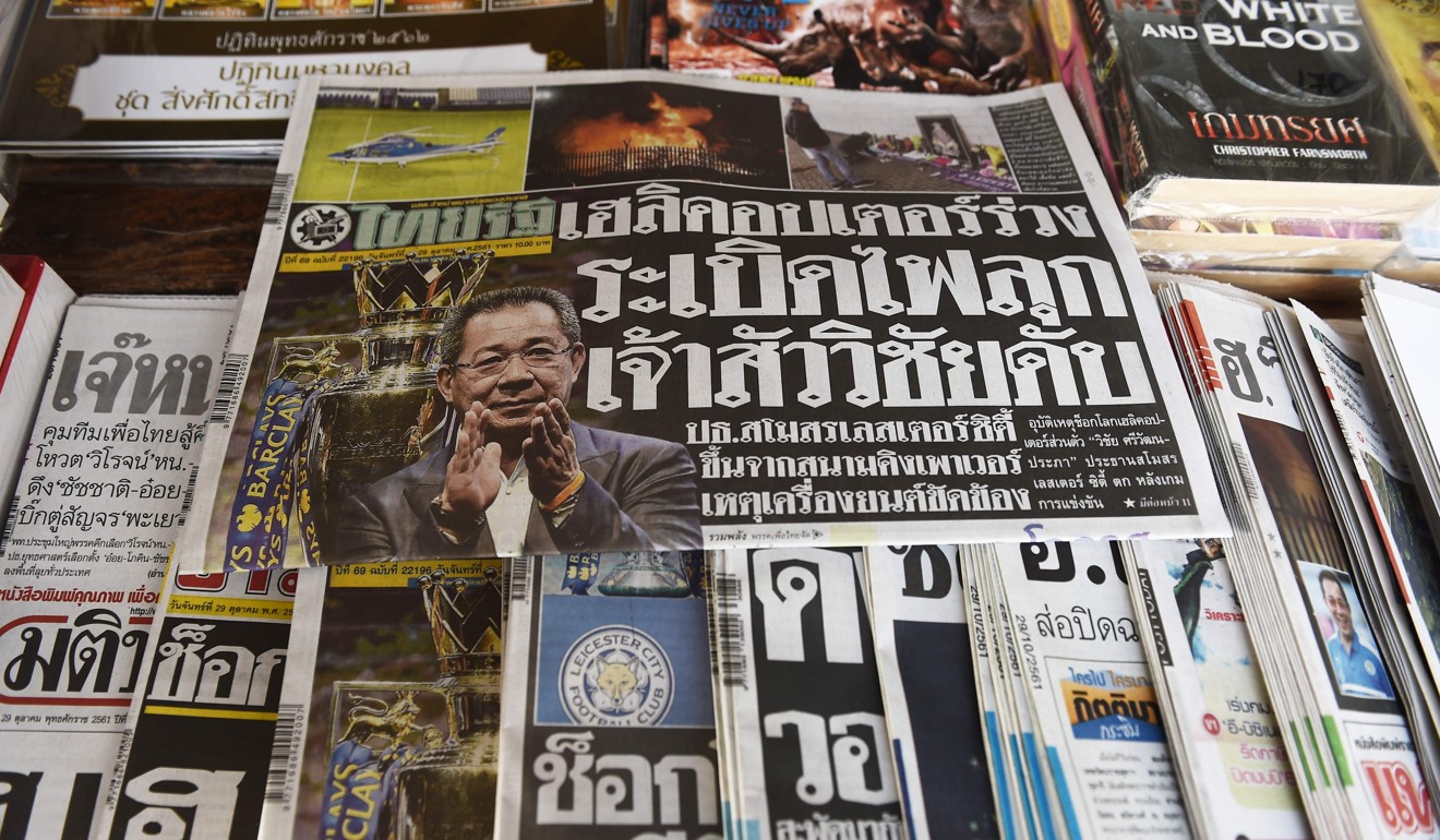 A Thai newspaper featuring the headline news about Leicester City chairman Vichai Srivaddhanaprabha’s helicopter crash is pictured at a news stand in Bangkok. Photo: AFP